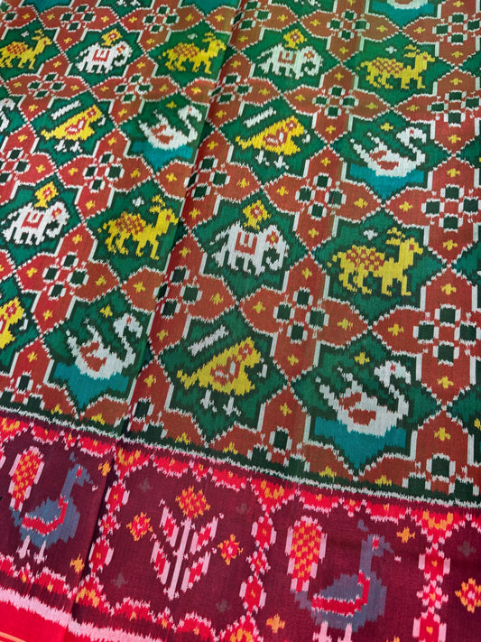 Green narikunj single ikat patola silk saree