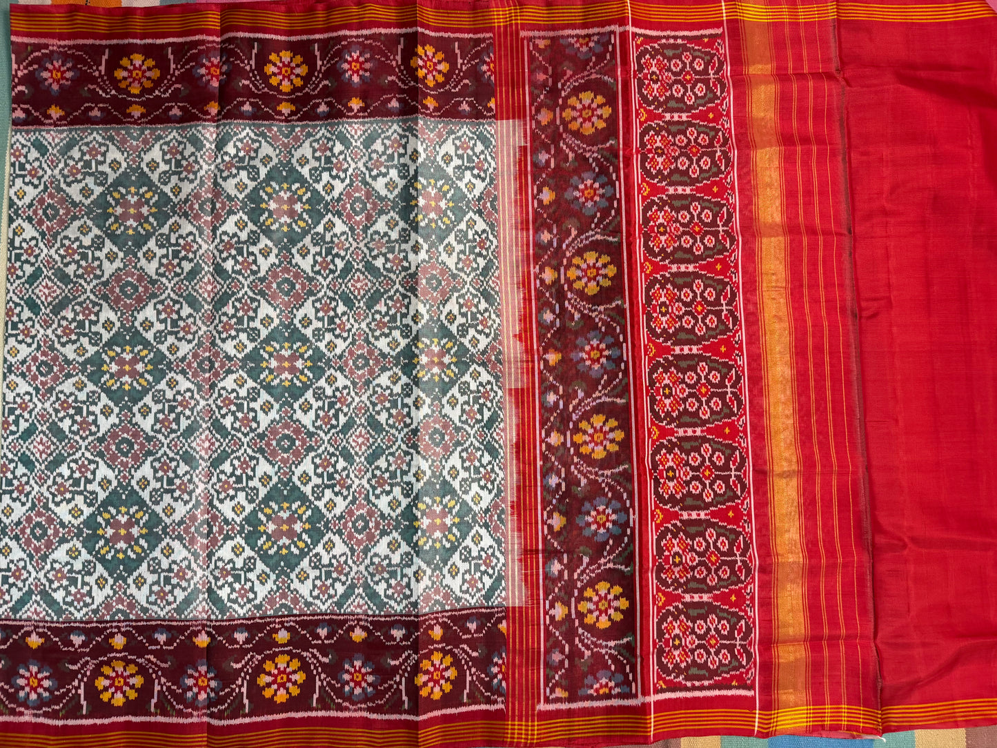 White navratan patola silk saree