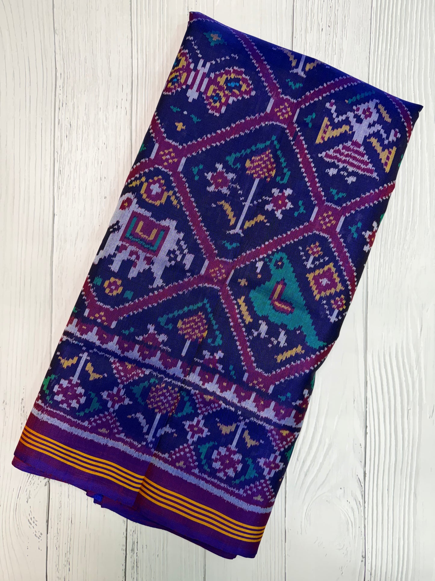 Purple adtala figure design single ikat patola saree