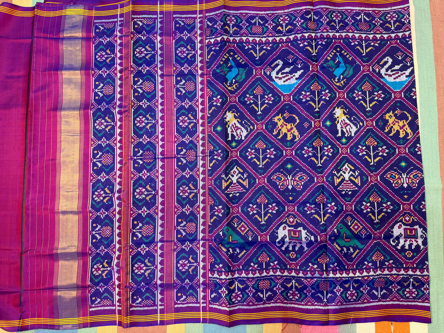 Purple adtala figure design single ikat patola saree