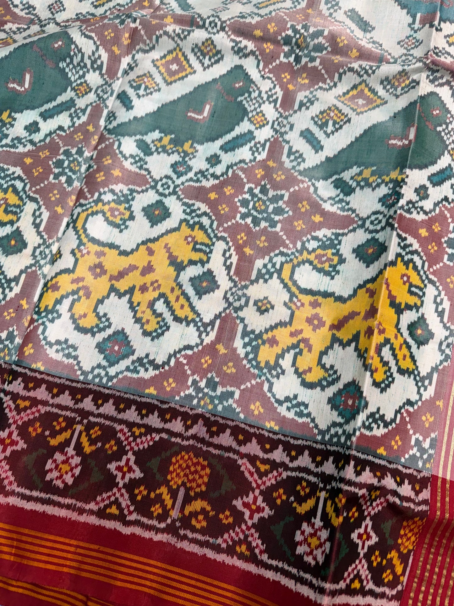 White figures single ikat patola silk saree