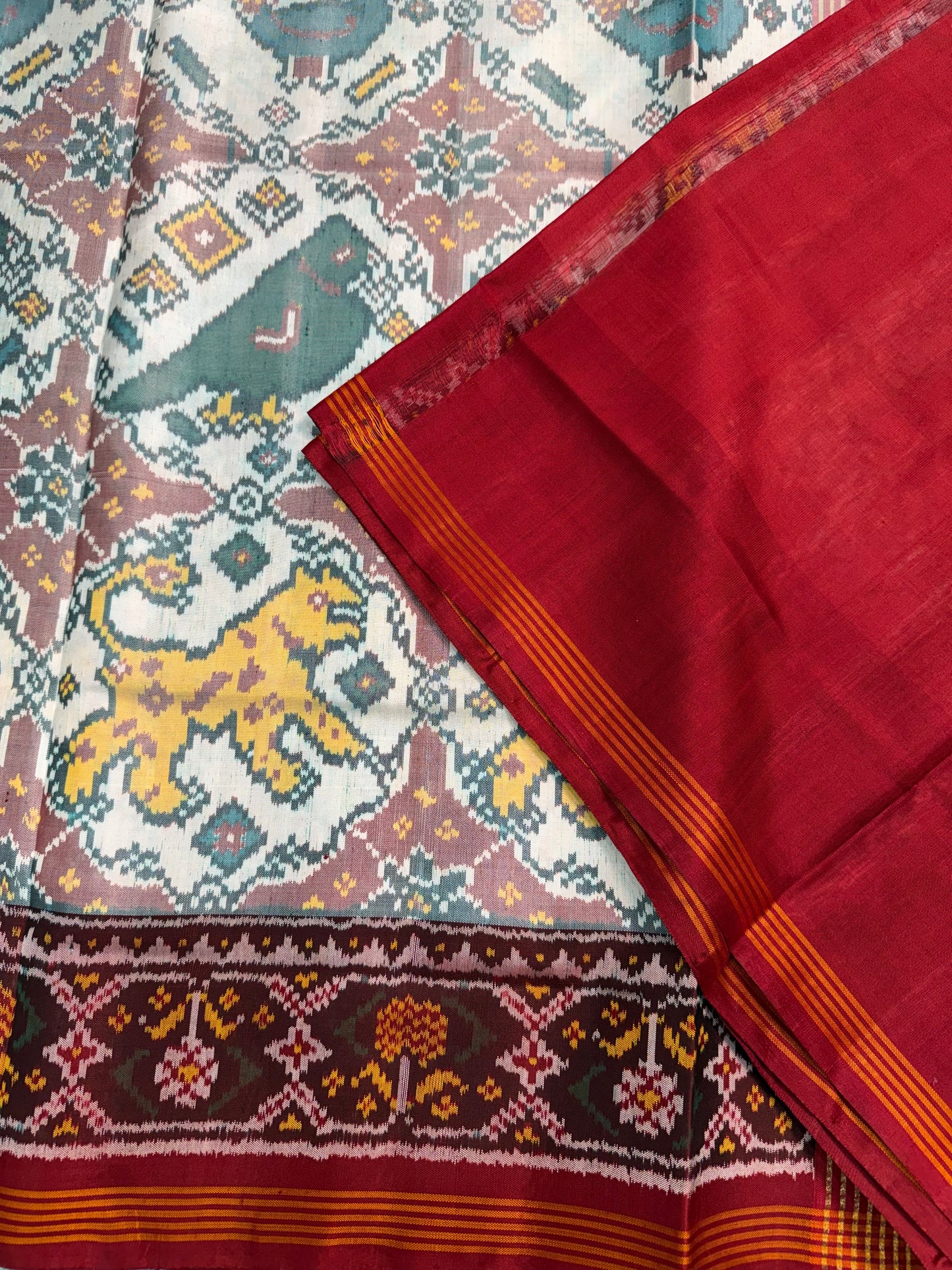 White figures single ikat patola silk saree